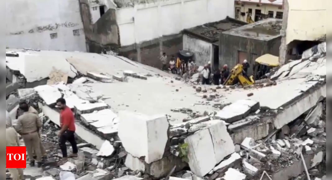 Four-storey building collapses in Gujarat's Surat, many feared trapped | India News