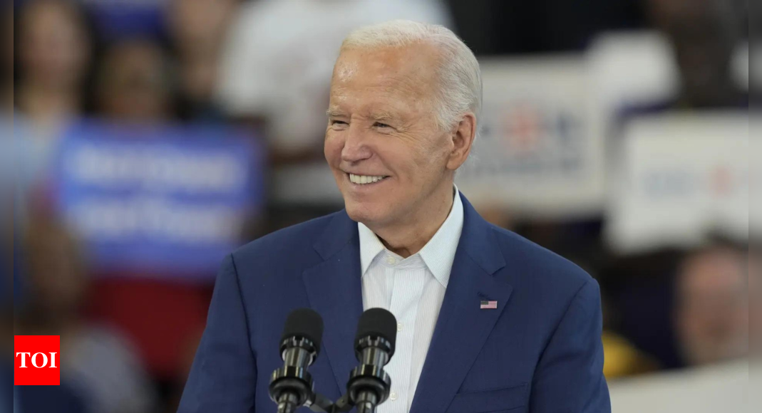 'Not going anywhere”: US President Joe Biden assures supporters in Detroit – Times of India