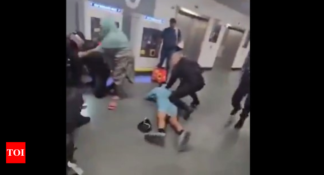 Brutal! Video of man's face kicked, head stamped by cop in Manchester Airport - Times of India