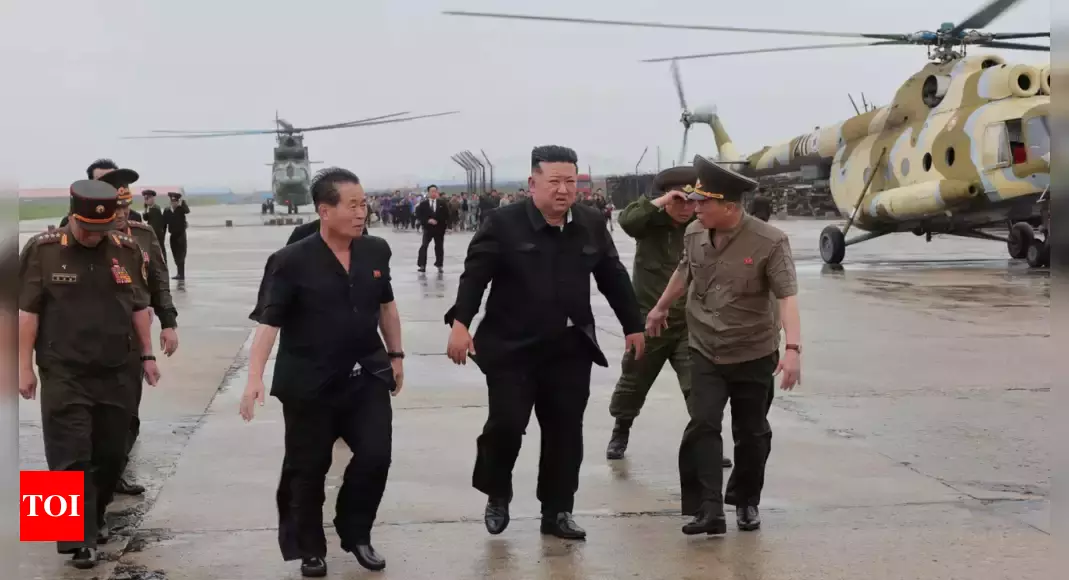 North Korea's Kim Jong Un inspects flooded areas near China border, KCNA says – Times of India