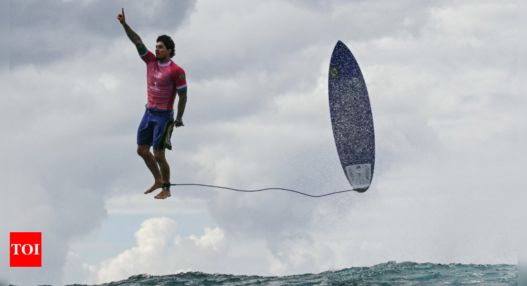 Viral photo: Why this Brazilian Olympic surfer Gabriel Medina's pose has captured the world's attention - Times of India