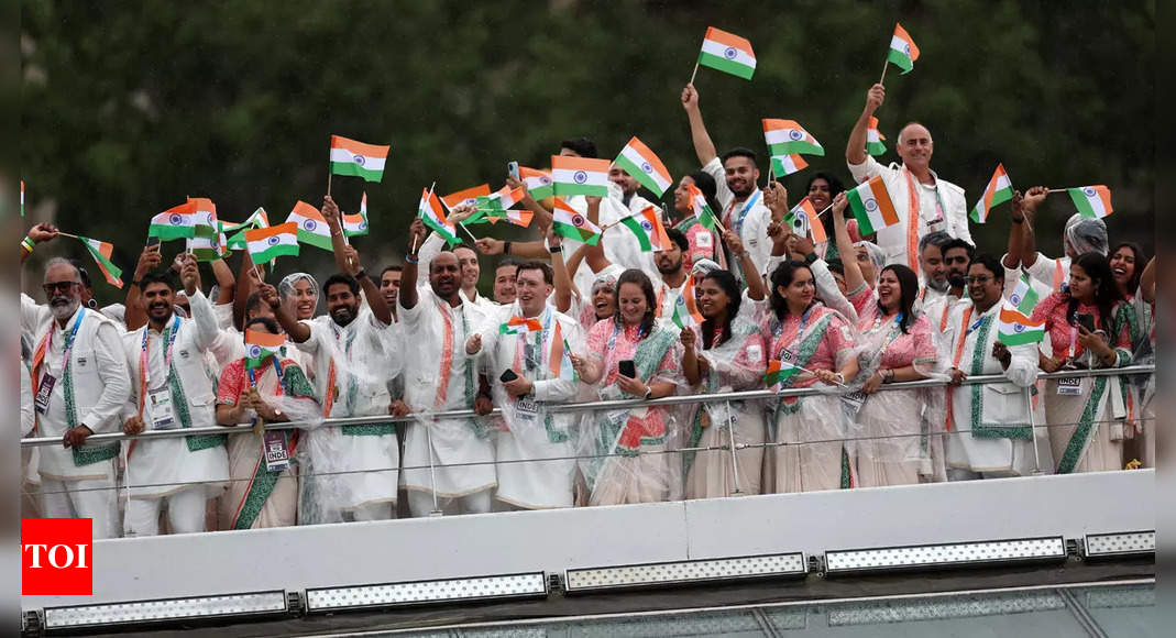 Paris Olympics 2024: Braving attacks by arsonists and pre-opening chaos, city of love gets Olympics underway with grand ceremony | Paris Olympics 2024 News – Times of India