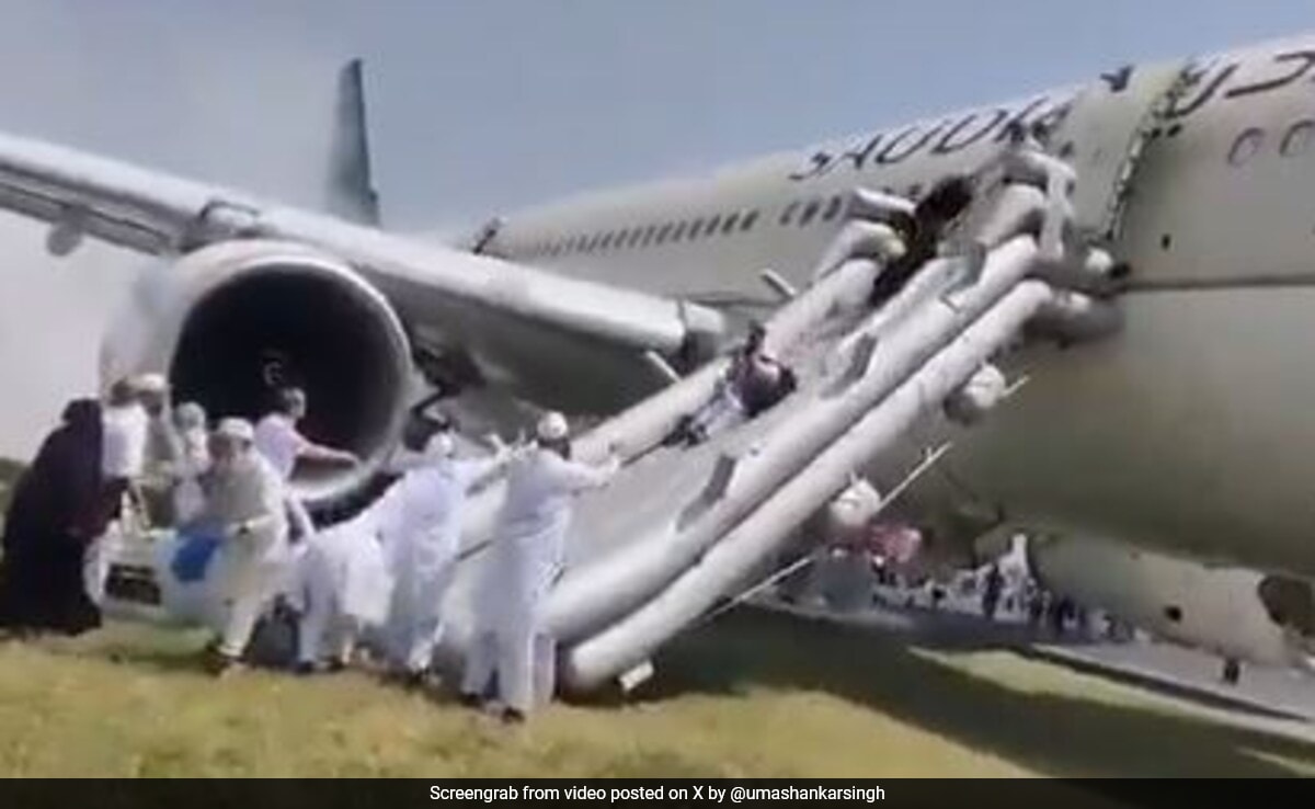 Watch: Fliers Slide Down Plane After Its Landing Gear Catches Fire In Pak