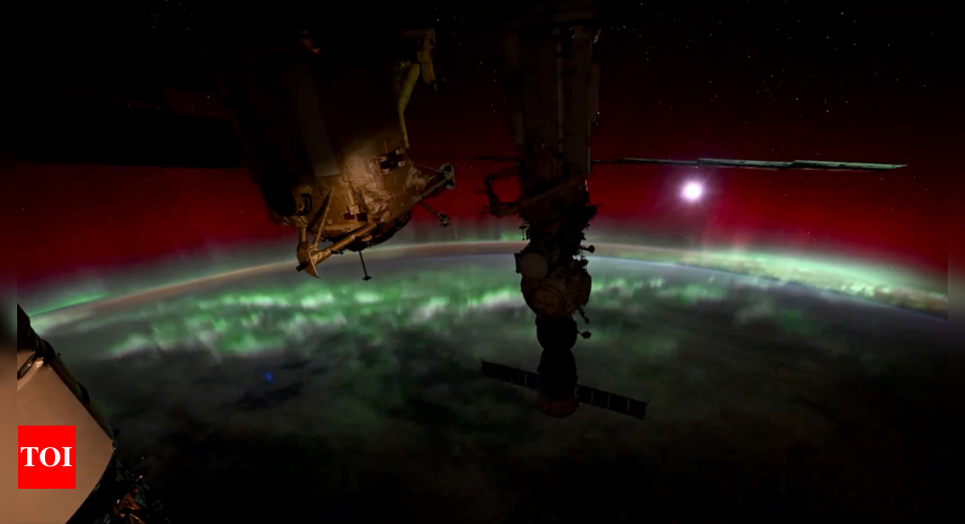 Watch: Nasa astronaut shares timelapse video showing Moon setting behind Earth amid auroras - Times of India