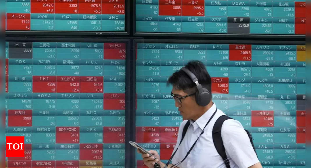 Global shares trade higher after Wall Street rises and Japan GDP data show growth