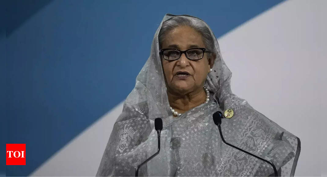 Bangladesh deposed PM Sheikh Hasina sued in 2013 'mass murder' case - Times of India