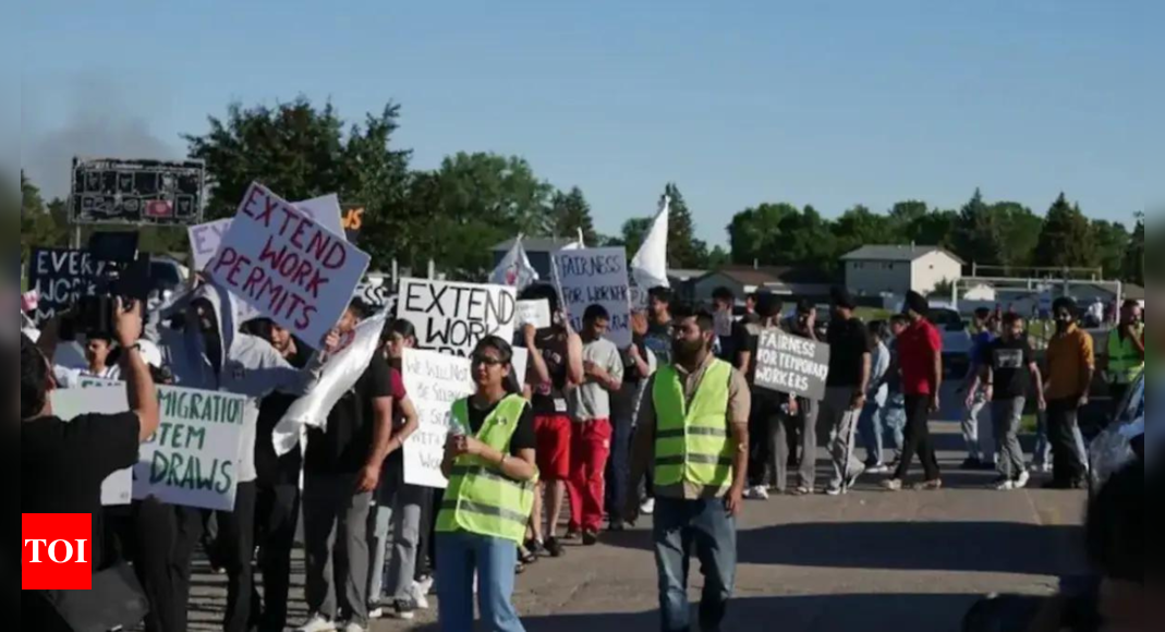 Indian students in Canada protest new immigration policies amid deportation fears - Times of India