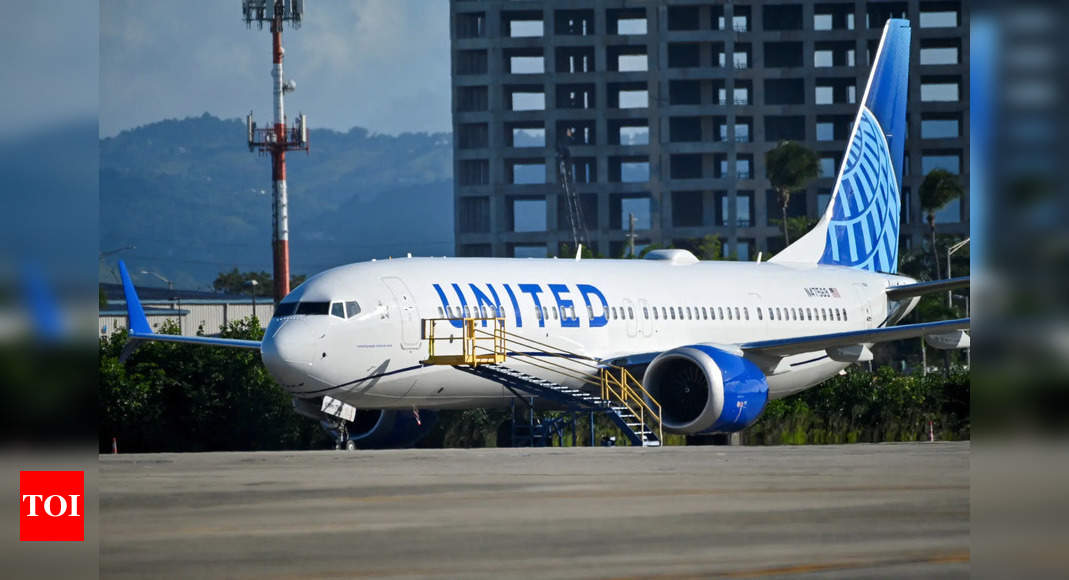 United Airlines News: United Airlines flight makes emergency landing after severe turbulence, many injured | World News – Times of India