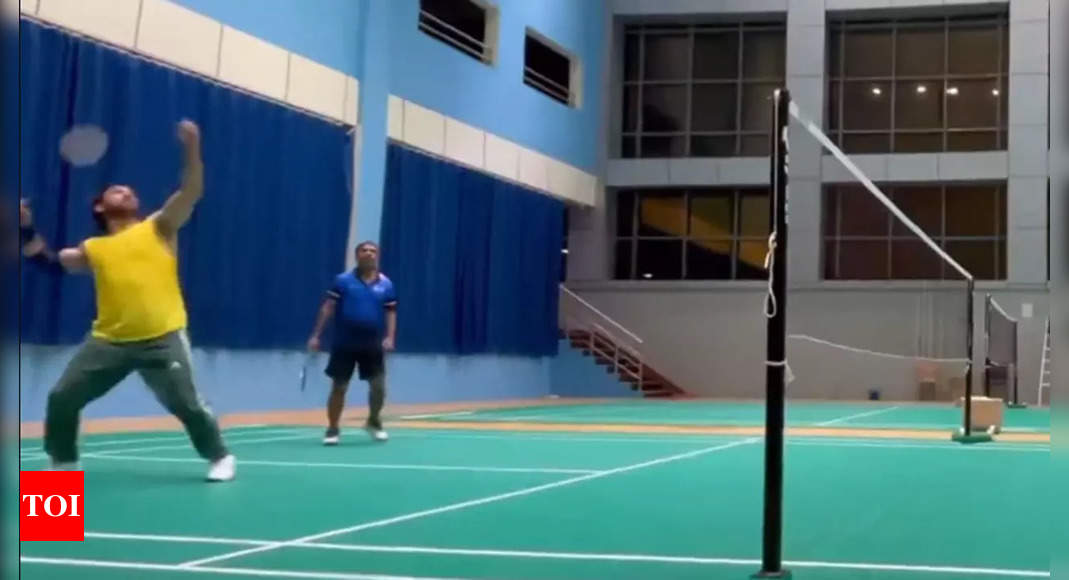 Fit as a fiddle: MS Dhoni's jump smash on the badminton court is an absolute rocket – Watch | Cricket News – Times of India