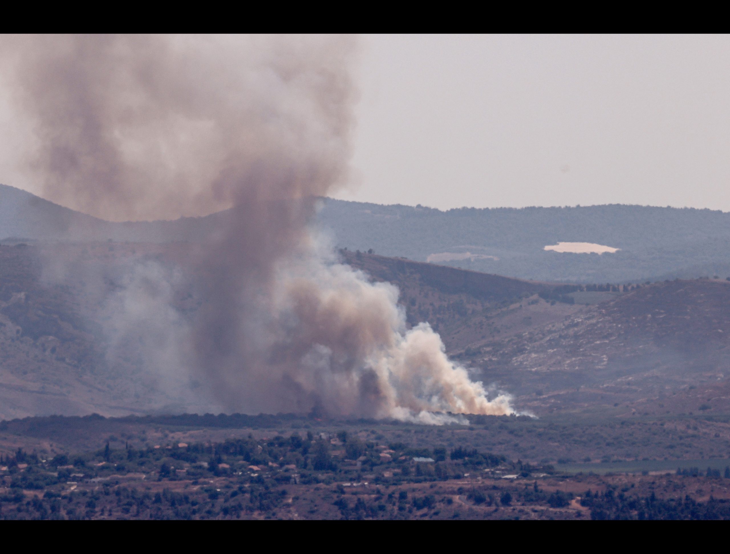 Hezbollah Says It Fired Dozens Of Rockets At Israel Amid Rising Tensions