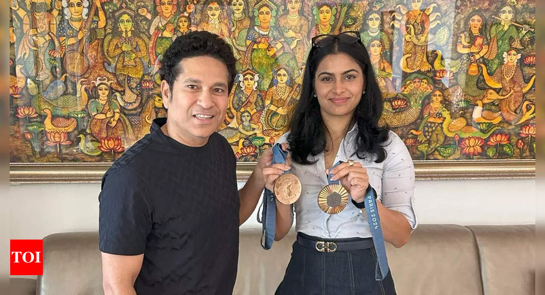 Shooting queen Manu Bhaker meets cricket god Sachin Tendulkar – see pics | More sports News – Times of India