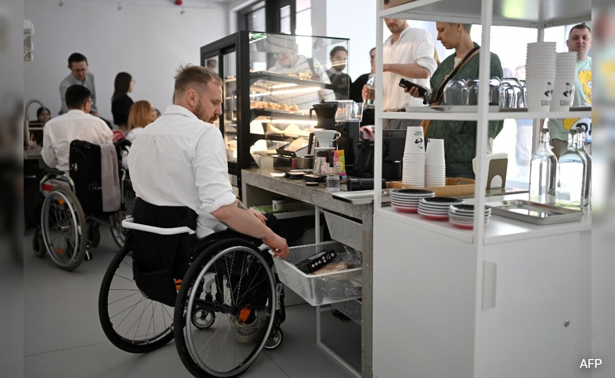 This Belarusian Wheelchair Barista Claims To "Make The World Better"