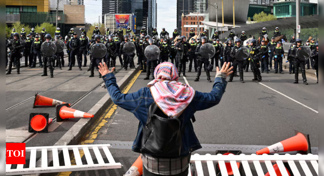 Anti-war protests turn violent at Australia's largest defence industry event - Times of India