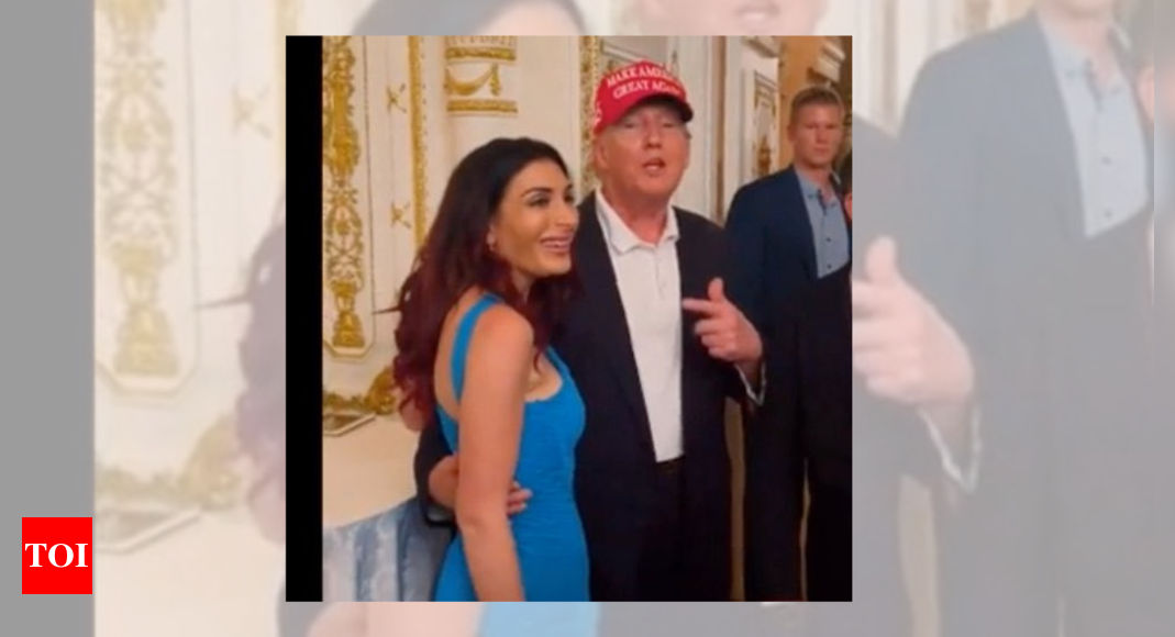 Laura Loomer's photo with Donald Trump viral. People ask where's Melania, where's wedding ring – Times of India