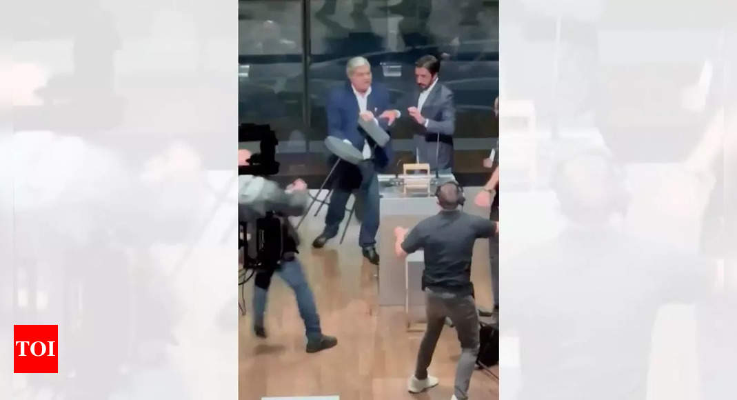 Watch: Brazil mayoral debate spirals out of control after candidate throws chair at rival – Times of India