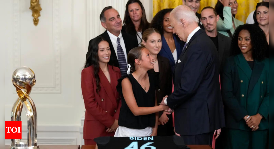 Joe Biden invites young girls on stage at White House event | World News - Times of India