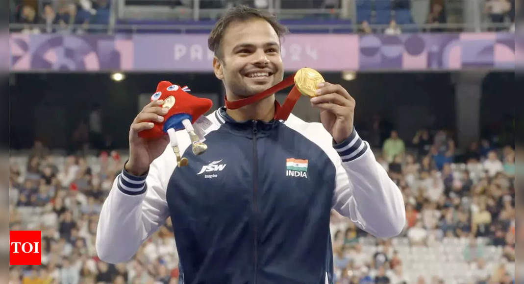 Sumit Antil wins gold in javelin throw F64, becomes first Indian man to defend title in Paralympics | Paris Paralympics News – Times of India