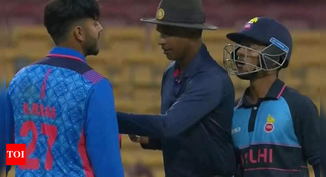 Nitish Rana-Ayush Badoni engage in a heated exchange during Syed Mushtaq Ali Trophy quarter-final. Watch | Cricket News – Times of India