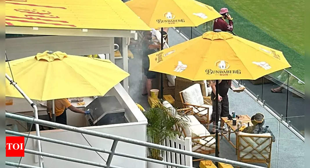 The grill, the beer, and the wait: How fans made the most of a rainy day at The Gabba | Cricket News - Times of India